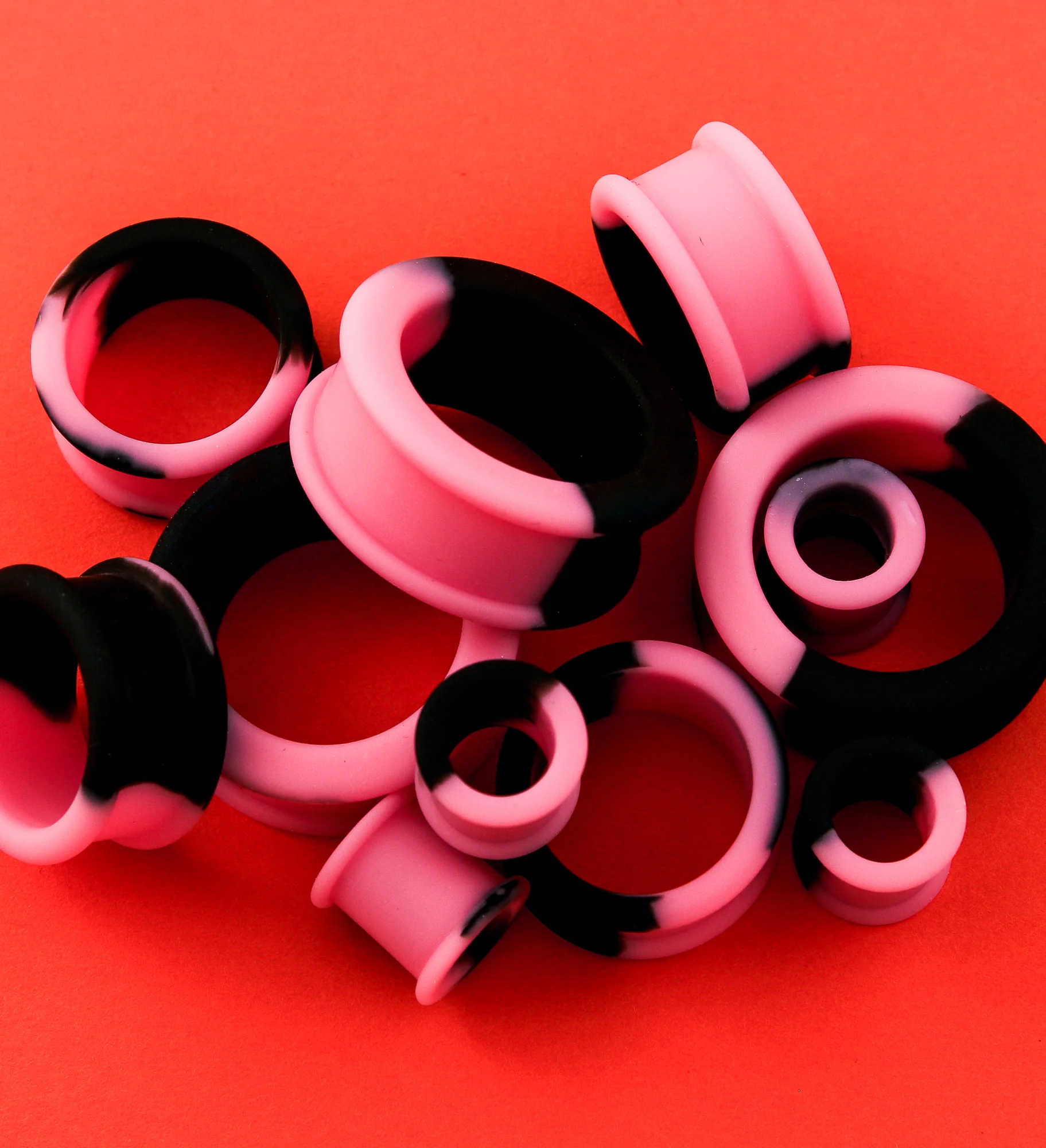 Pink And Black Double Flare Silicone Tunnel Plugs - Mrs Treak