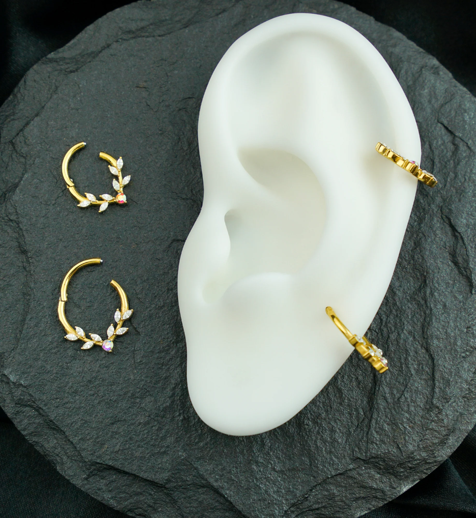 Gold PVD Laurel Vine Clear And Rainbow Aurora CZ Stainless Steel Hinged Segment Ring - Mrs Treak