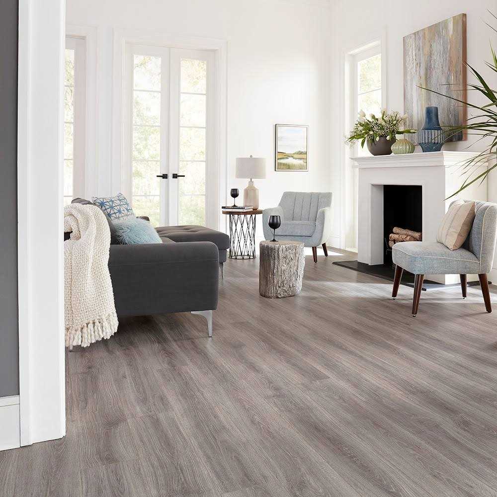 Pergo Portfolio + WetProtect 10-mm T x 7-1/2-in W x 54-in L Waterproof Wood Plank Laminate Flooring - MT - Mrs Treak